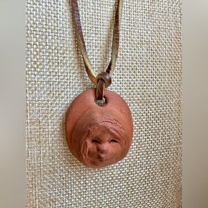 1970's Ann Entis American Folk Art Little Girl Face Pottery Pendant Necklace